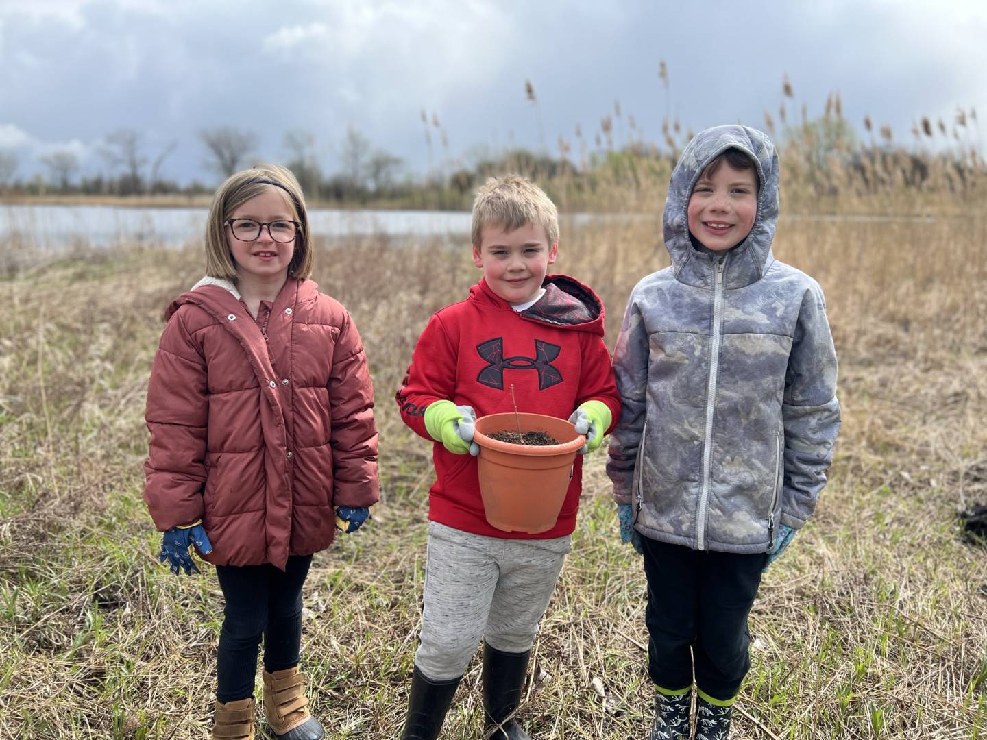 Kids at Earth Day Planting Trees